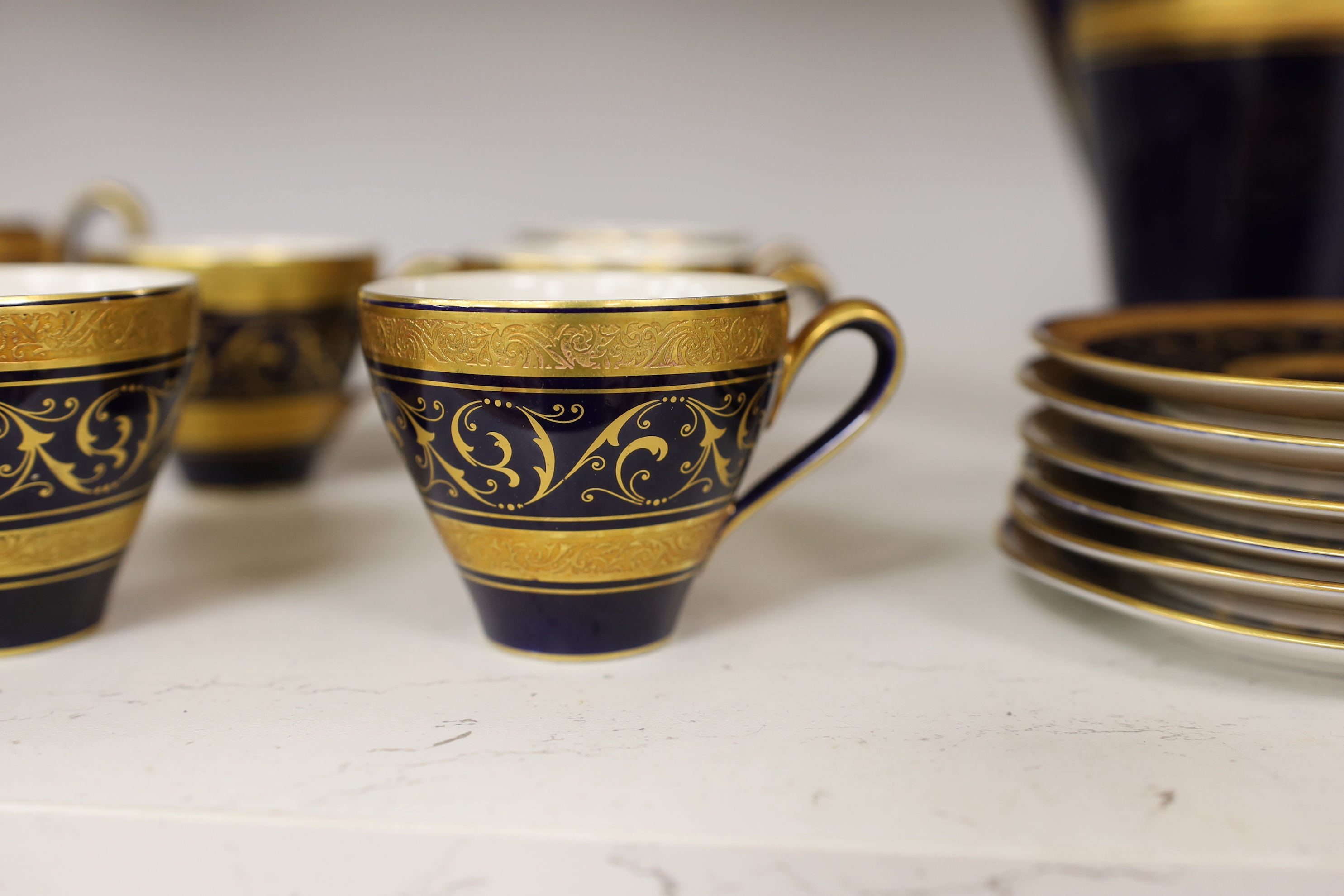 A Lindner cobalt and gilt part coffee set